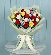 Букет цветов из:  Розы в Партените
