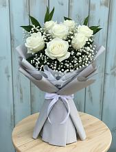 Букет цветов из:  Розы в Партените